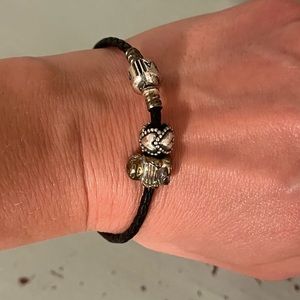 Pandora bracelet with charms.